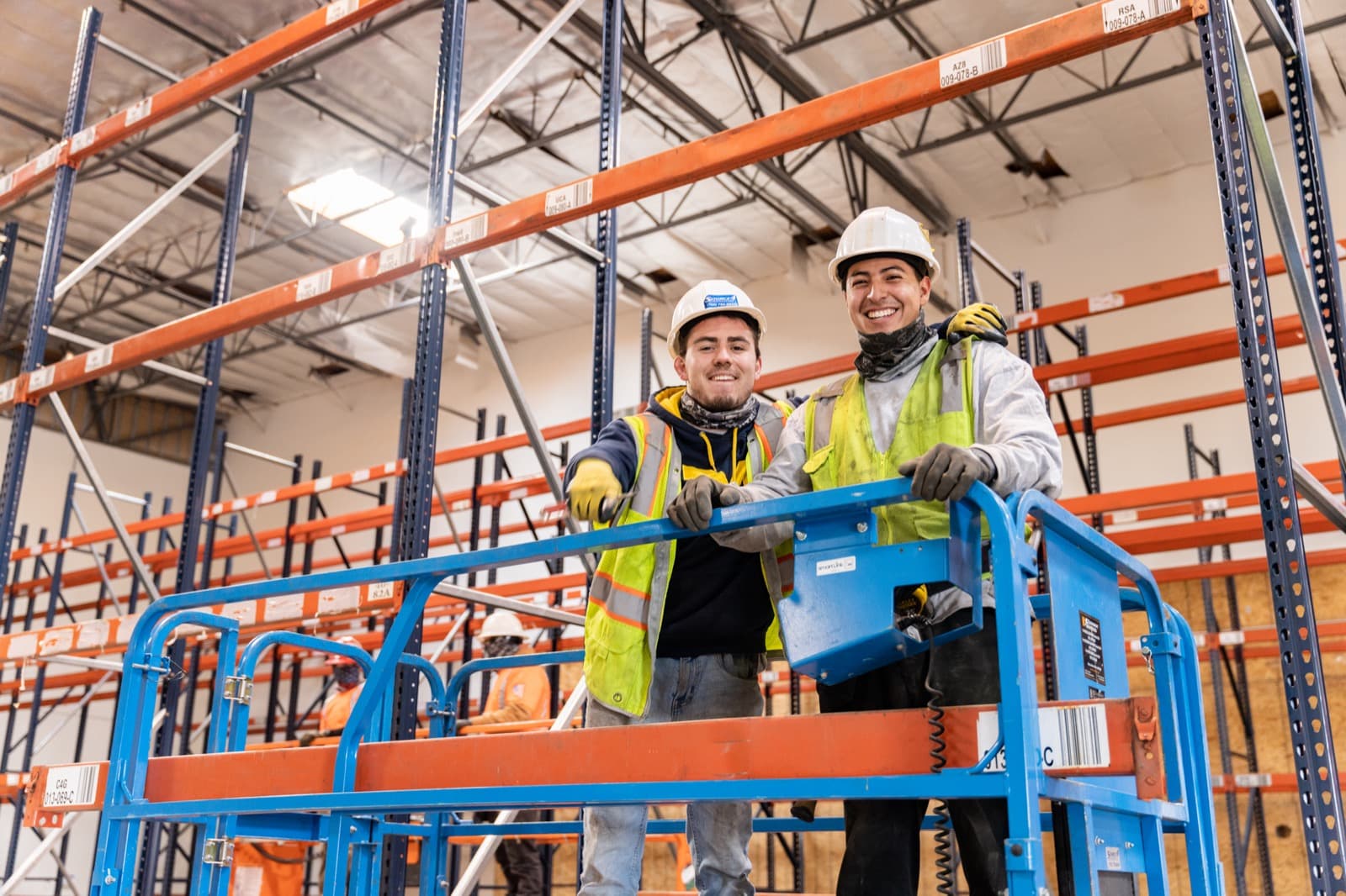 Source 4 crew installing pallet racking in a warehouse